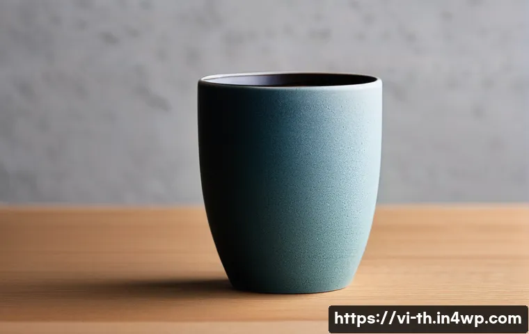 물성매력 디자인 사례 분석 - **Prompt:** A close-up shot focusing on a human hand gently caressing a matte, subtly textured ceram...